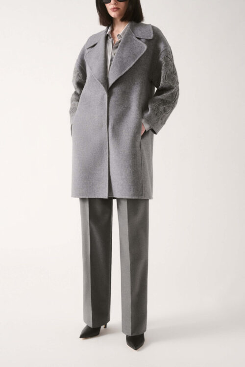 Spodnie OGGI z wełny, z prostym krojem i zaprasowanym kantem.