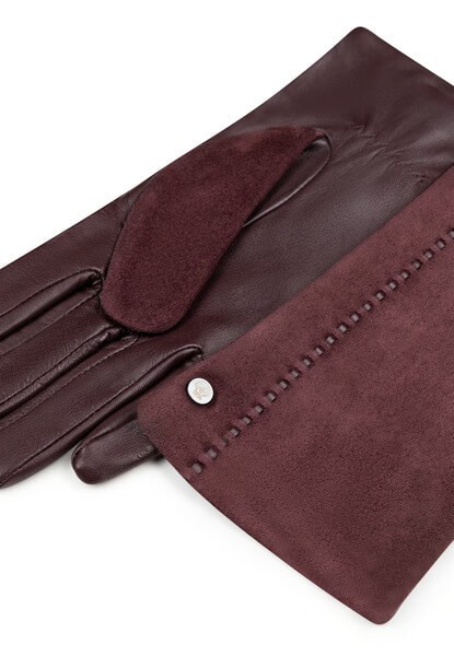 Rękawiczki z wyjątkową strukturą skóry koziej i owczej, zapewniające ochronę przed zimnem i elegancki wygląd.